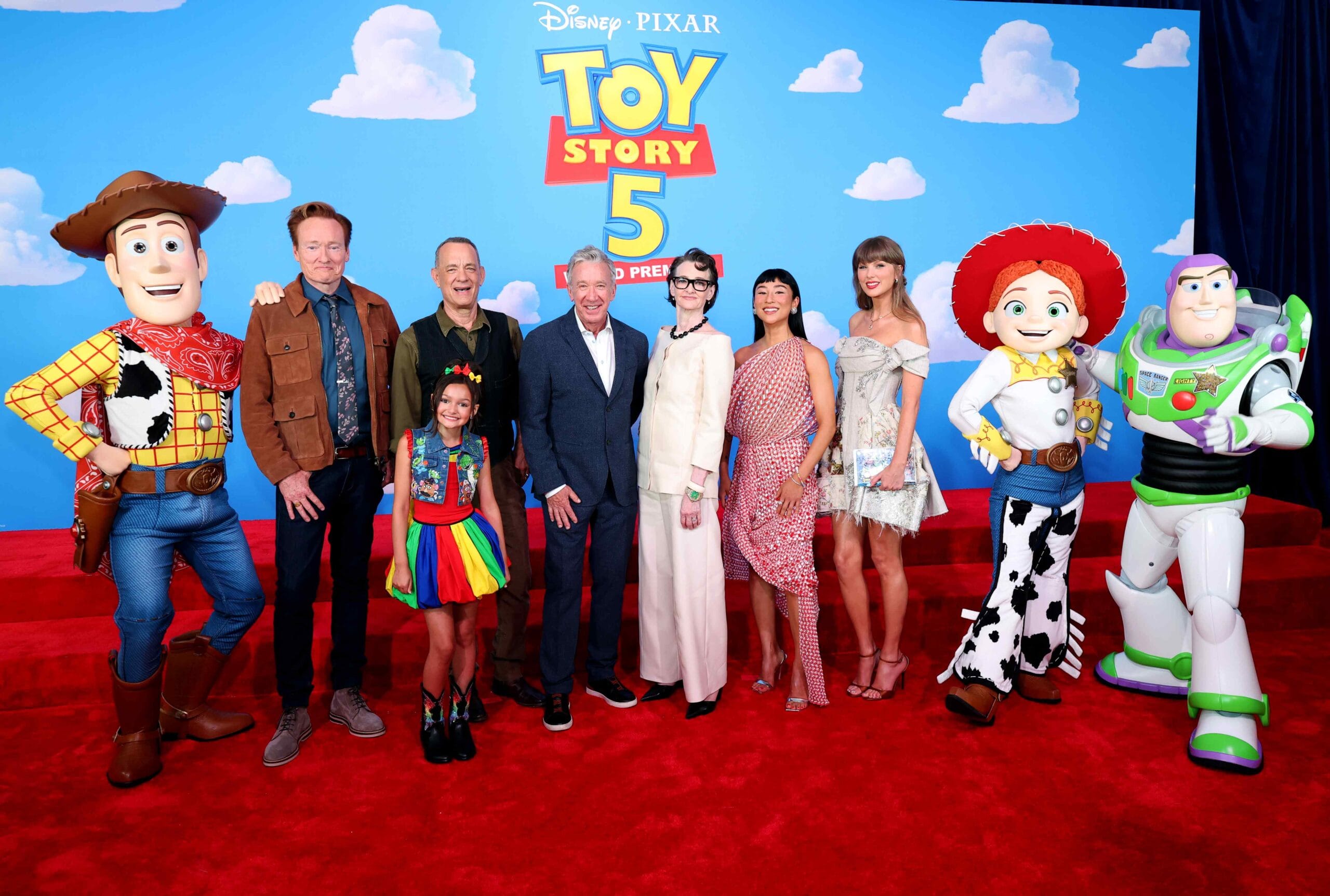LOS ANGELES, CALIFORNIA - JUNE 09: (EDITORIAL USE ONLY. NO STANDALONE PUBLICATION USE. NO SPECIAL INTEREST OR SINGLE ARTIST PUBLICATION USE; NO BOOK USE) (L-R) Conan O'Brien, Scarlett Spears, Tom Hanks, Tim Allen, Joan Cusack, Greta Lee and Taylor Swift attend the Toy Story 5 Los Angeles World Premiere at Dolby Theatre in Los Angeles, California on June 09, 2026. (Photo by Kevin Mazur/Getty Images for for TAS Rights Management)